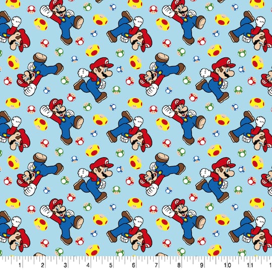 Nintendo® Mario Mushroom Light Blue Toss Cotton Fabric